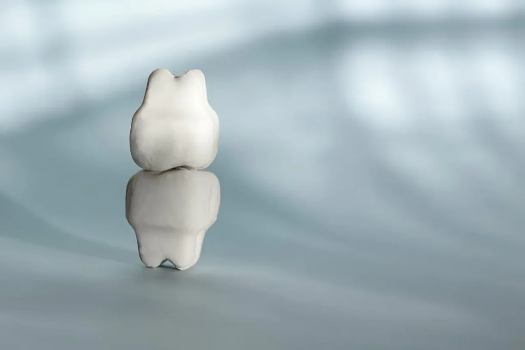 dois dentes, um por cima do outro