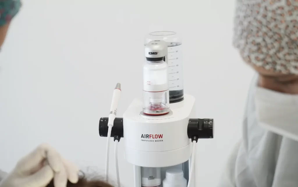 Airflow aparelho para limpeza e polimento dentário